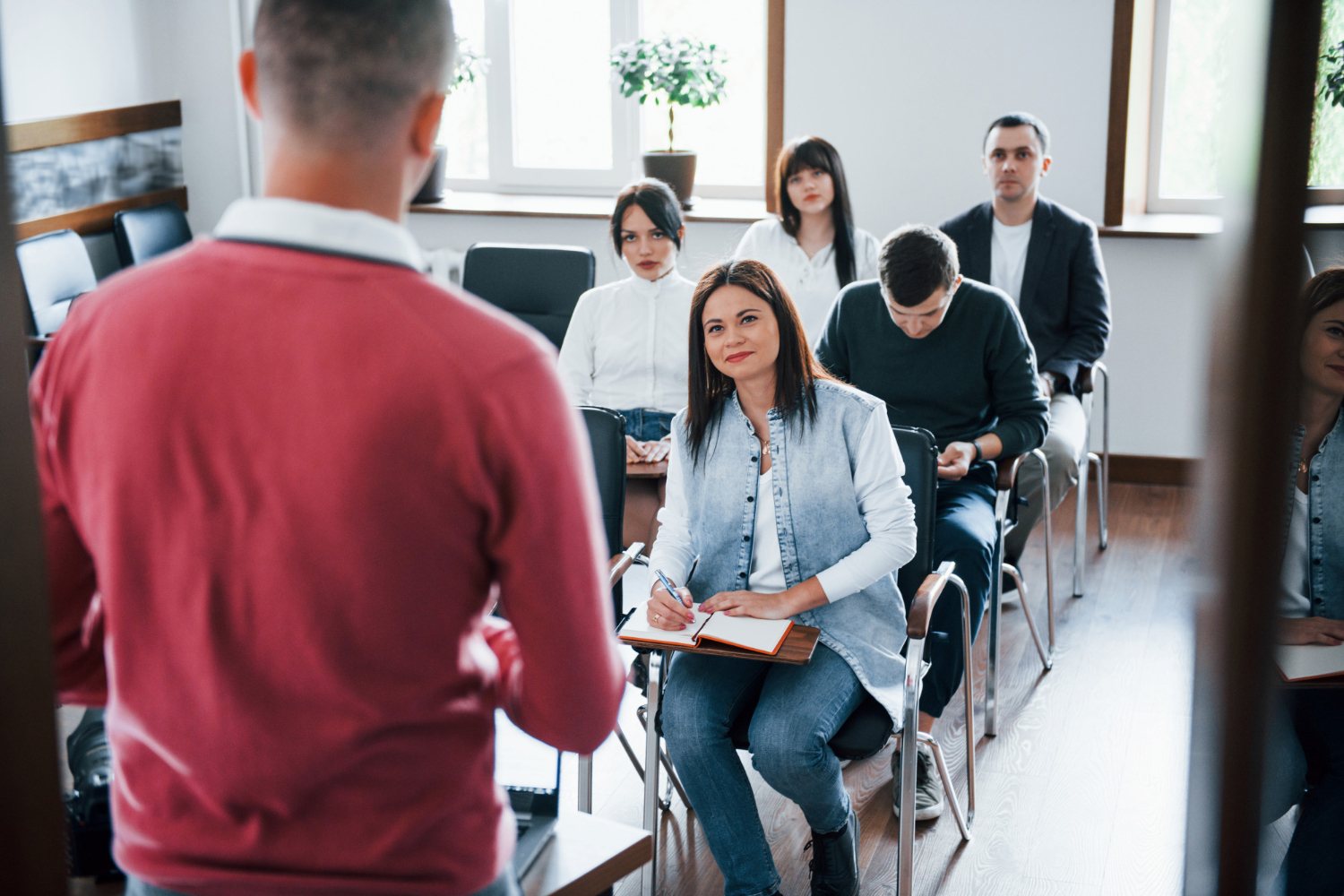 Red-shirt-group-people-business-conference-modern-classroom-daytime